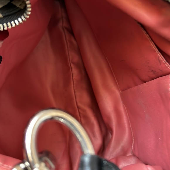 Authentic Coach purse, gentle use.  Inside looks more orange than pink - Picture 9 of 11